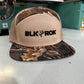 Realtree Advantage 7 Panel BLKROK Logo